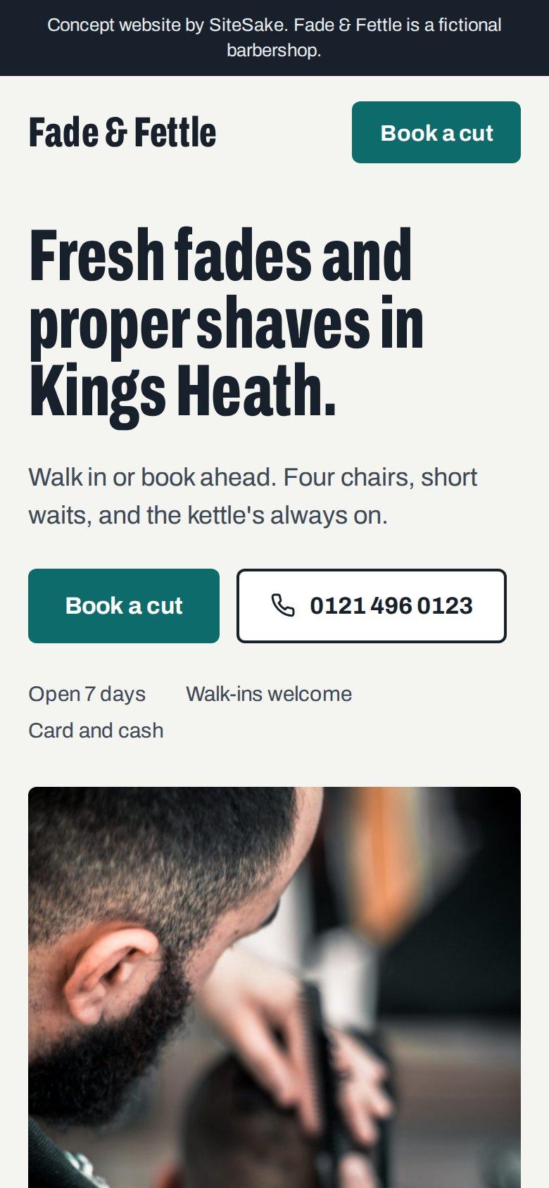 Barbershop website on a phone, built by SiteSake
